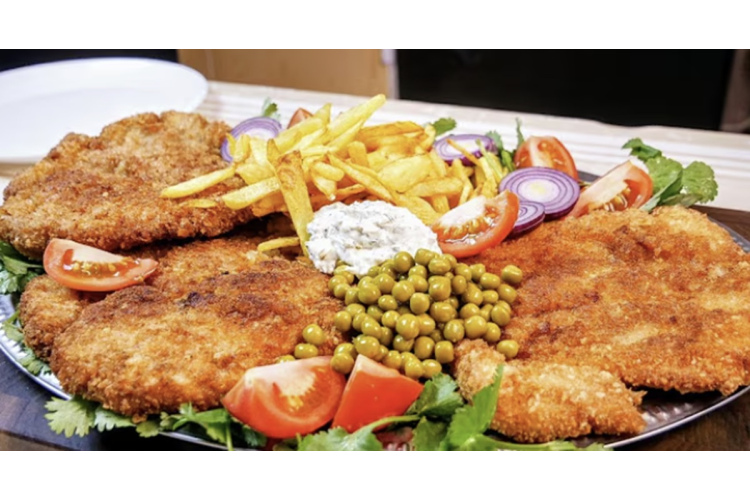 Vīnes šnicele: tradicionāli gatavošanas soļi nevainojamam rezultātam